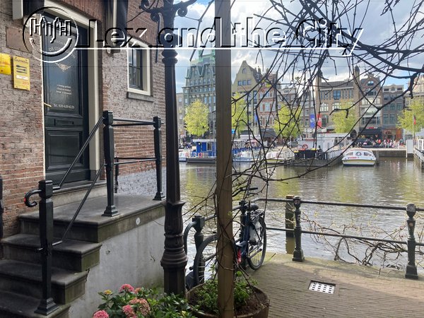 Hidden gem, facing the former harbour Damrak, during a guided walking tour of the oldest parts of Amsterdam